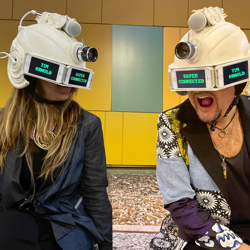START A CONVERSATION : Tim Arnold on having his new album banned, and then backed by Apple - Part One 24 3. Tim Arnold and Kate Alderton wearing the iHead at SXSW 2022