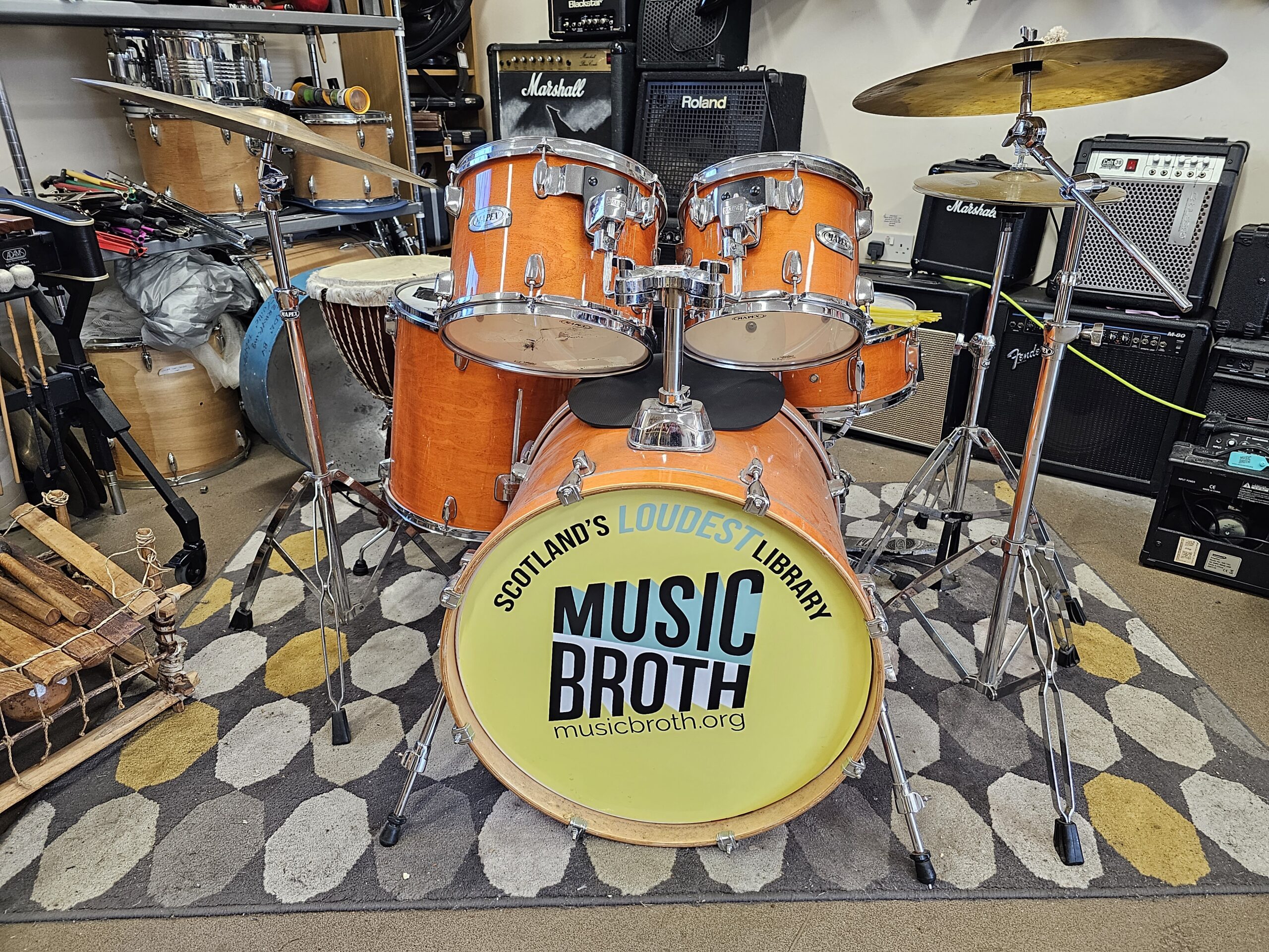 Drumkit with Music Broth on the front of the kit