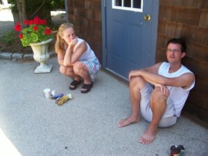 Emi and Kristin by shed door