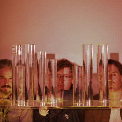 The three band members of METZ