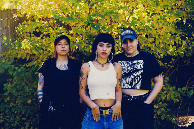 The three members of the band Shooting Daggers