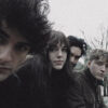 The four band members of slate