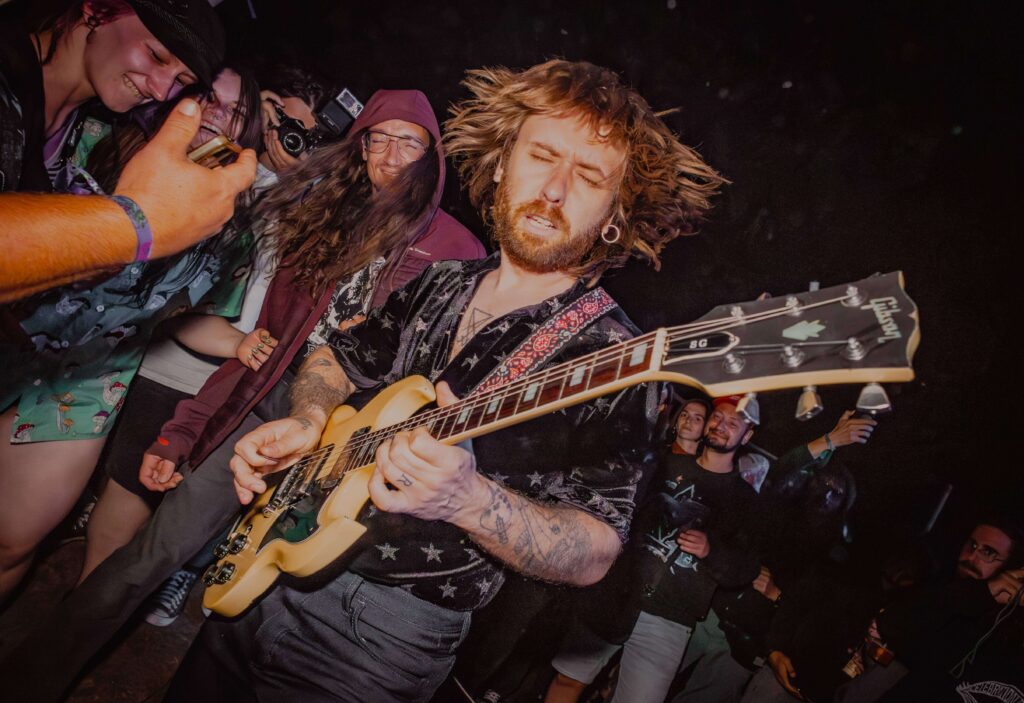 FESTIVAL REPORT: Bearstone Festival 37 Kadavar guitarist out in the crowd.