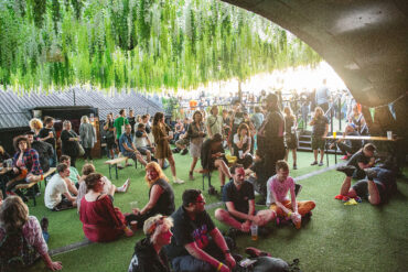 Supersonic festival goers enjoying the rooftop garden.