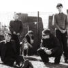 Black and white photo of the six members of the band Cardinals