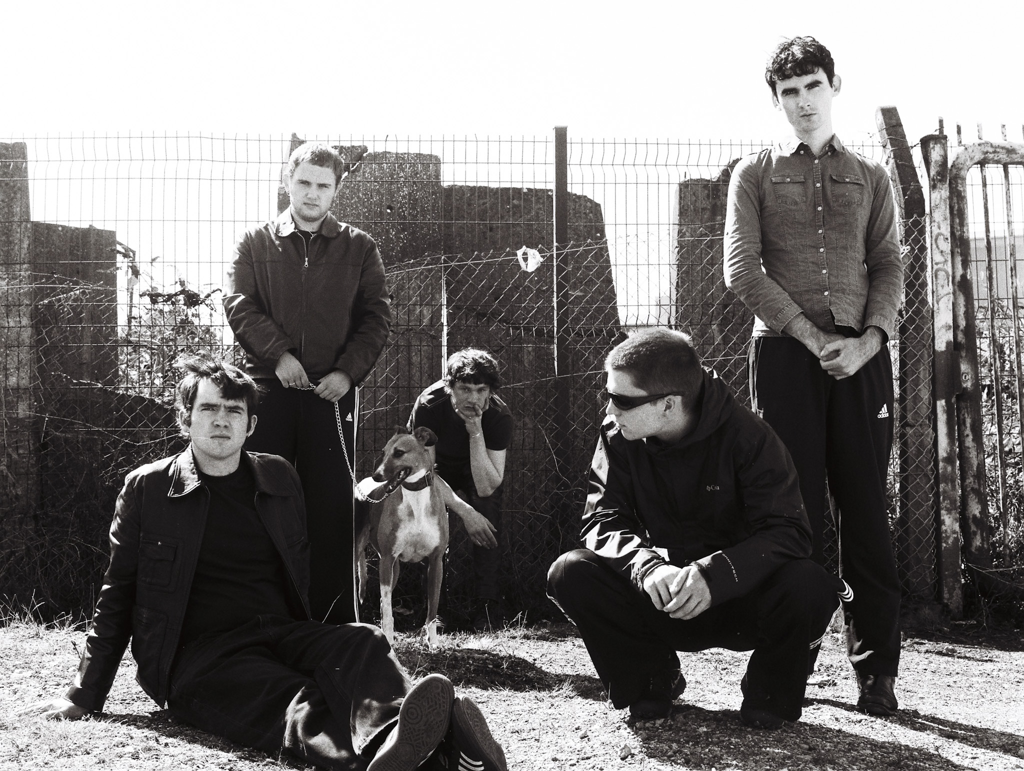 Black and white photo of the six members of the band Cardinals