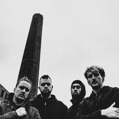 Black and white photo of four members of Maruja
