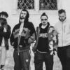 Black and white photo of the four members of band Maruja