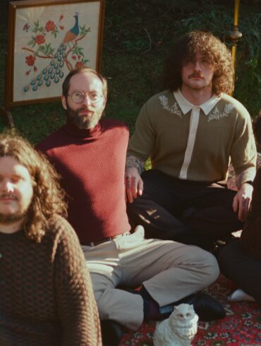 The four members of the band Junk Drawer