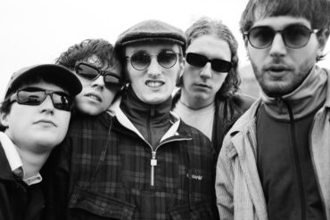 Black and white photo of Scottish band Brògeal