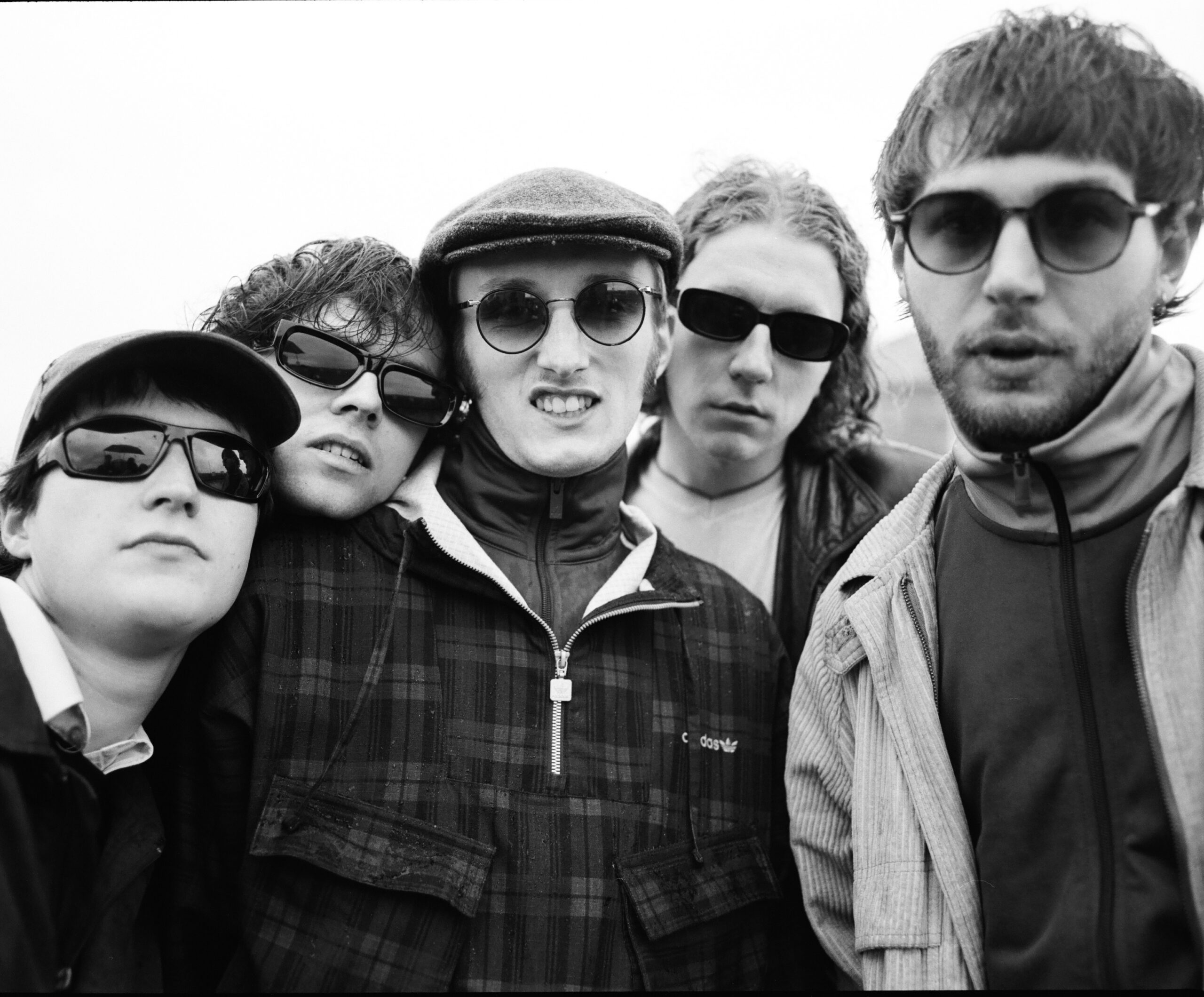 Black and white photo of Scottish band Brògeal